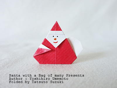 origami Santa with a bag of many presents, Author : Yoshihiro Umemoto, Folded by Tatsuto Suzuki